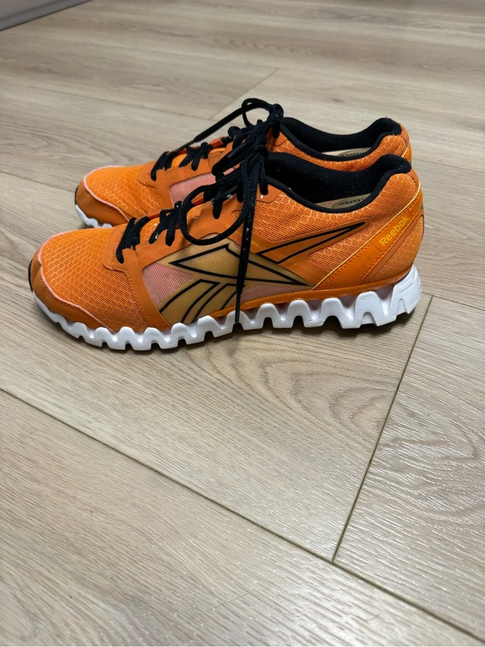 Reebok 3D FuseFrame running shoes in orange with black accents Men’s Size 10